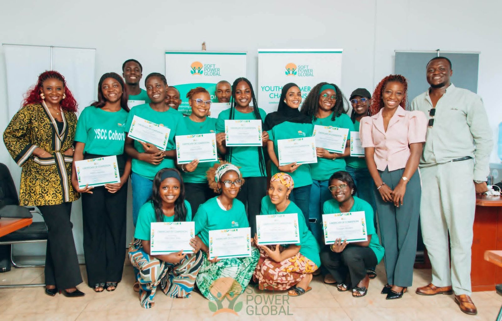 YSCC graduating fellows pose together with their certificates at the programme graduation